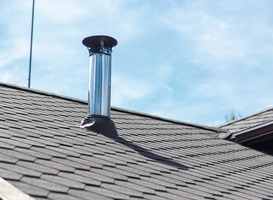 Normal_chimney-pipe-from-stainless-steel-on-the-roof-of-t-2021-08-26-17-11-04-utc-min__1_