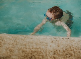 Normal_kid-swimming-underwater-in-a-pool-in-summer-2022-11-02-00-01-17-utc__1_