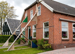 waardevermindering huizen aardbeving gecompenseerd